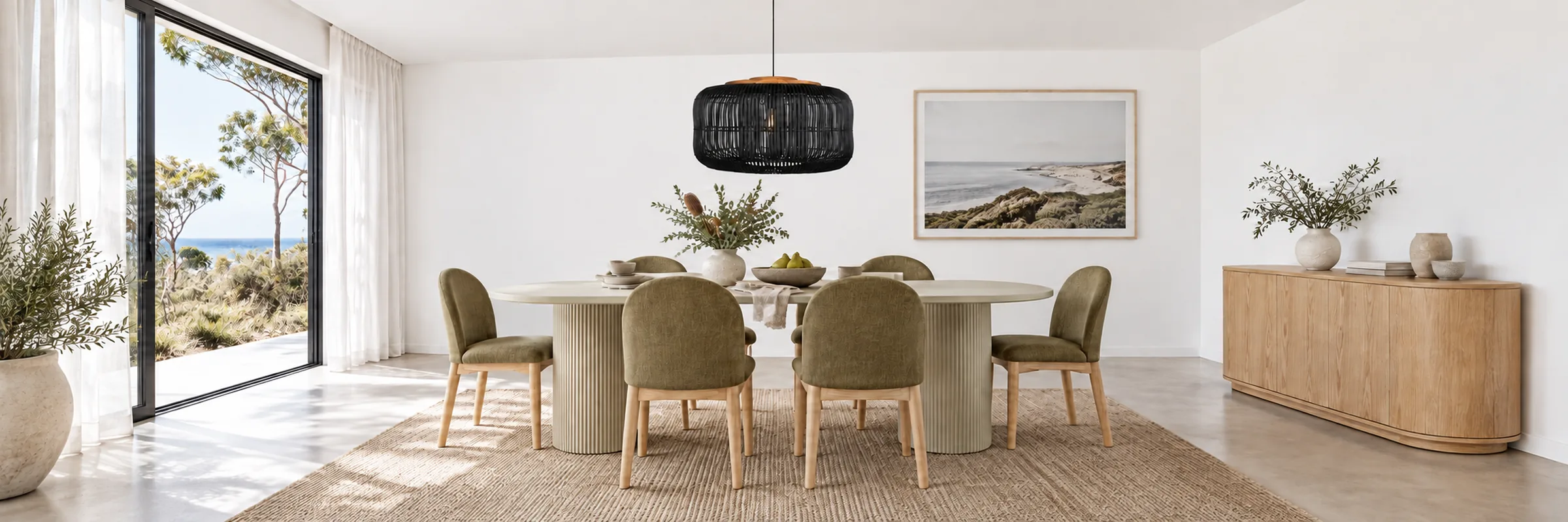 dBodhi Bucket Hanging Lamp styled in a furnished white coastal home