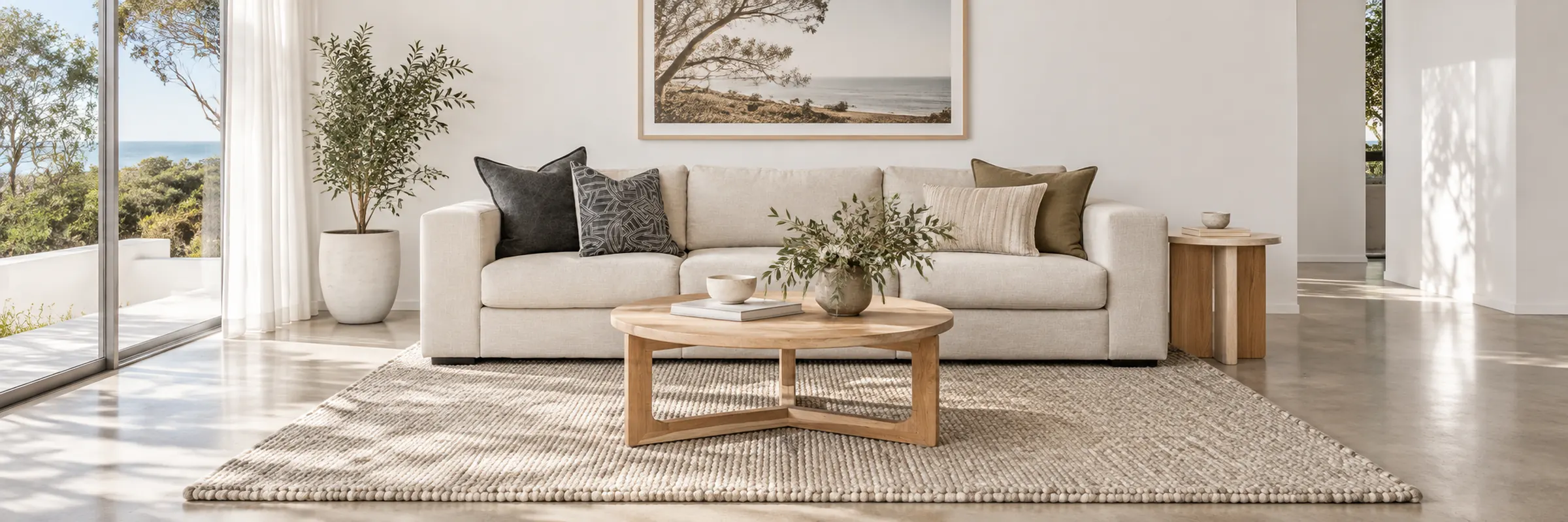 Chief Wool & Viscose Rug Oat Natural styled in a furnished white coastal home