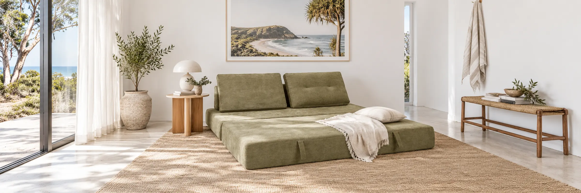 Gwen Sofa Bed styled in a furnished white coastal home